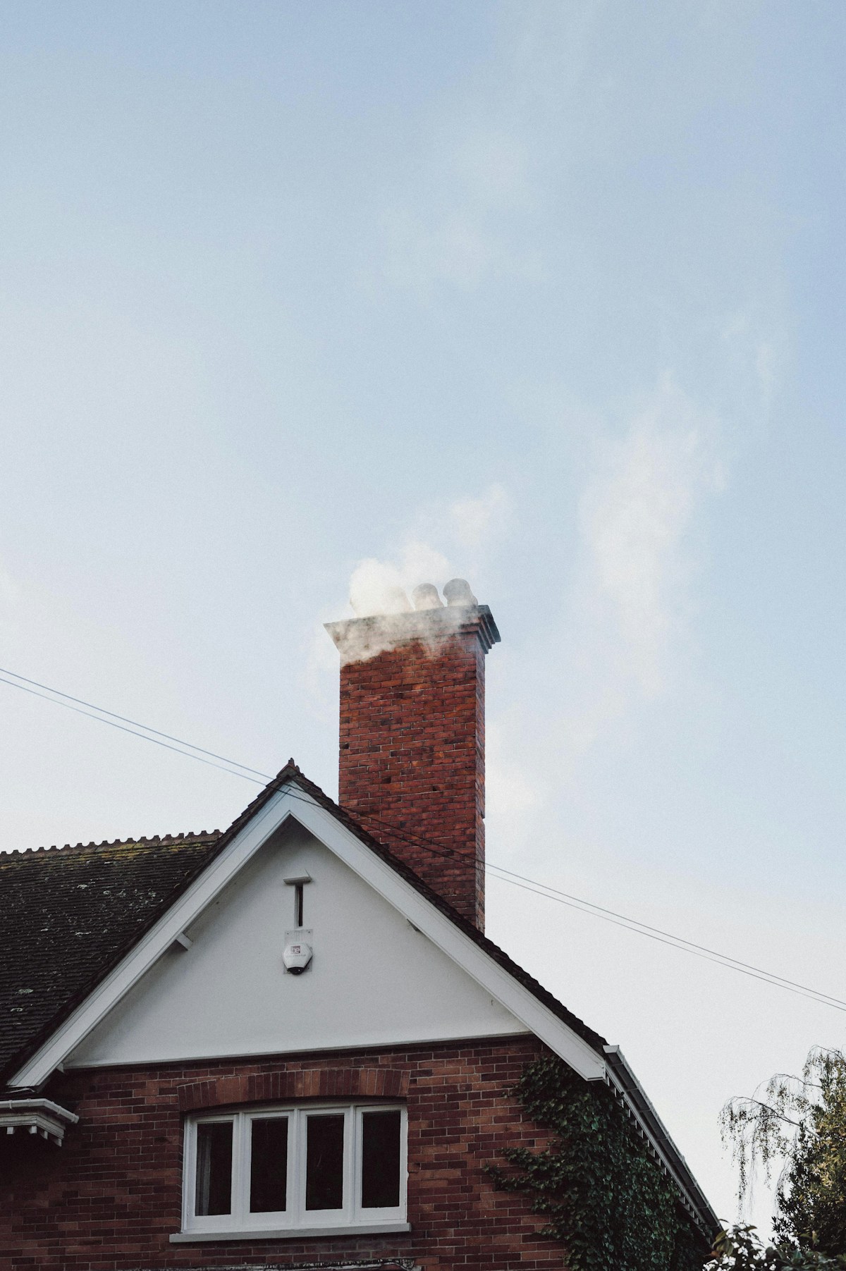 Residential house with brick chimney